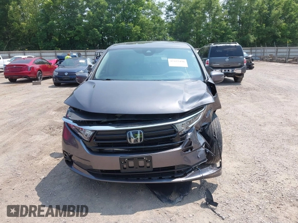 2022 Honda Odyssey Touring z VIN 5FNRL6H83NB023583, wystawiony jako IAAI lot #42425498 z przebiegiem Nie podano mil oraz . Historia ofert i sprzedaży dostępna na DreamBid. Obrazek 11.