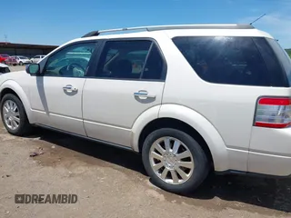 2009 Ford Taurus X Limited z VIN 1FMDK03W99GA03698, wystawiony jako IAAI lot #42243428 z przebiegiem 158 551 mil mil oraz . Historia ofert i sprzedaży dostępna na DreamBid. Obrazek 14.