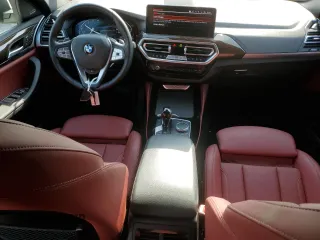 2024 BMW X4 xDrive30i z VIN 5UX33DT09R9U71062, wystawiony jako Copart lot #52200375 z przebiegiem 21 979 mil mil oraz Szkoda całkowita • Salvage title. Historia ofert i sprzedaży dostępna na DreamBid. Obrazek 8.