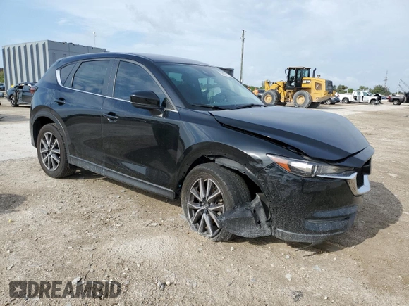 2021 Mazda CX-5 Sport with VIN JM3KFABM9M0301909, listed as a Copart auction lot 52188175 with 73,607 mi miles and Non Repairable. Bid and sale history available at carsss.com. Image 4.