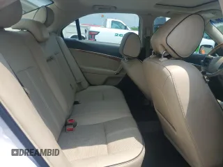 2012 Lincoln MKZ z VIN 3LNHL2JC7CR810191, wystawiony jako Copart lot #59125485 z przebiegiem 154 076 mil mil oraz Szkoda całkowita • Salvage title. Historia ofert i sprzedaży dostępna na DreamBid. Obrazek 10.