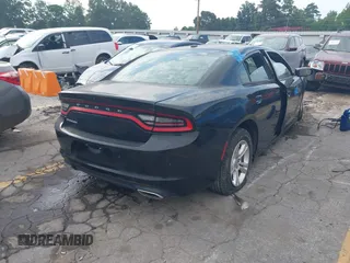 2020 Dodge Charger SXT with VIN 2C3CDXBG5LH207458, listed as a IAAI auction lot 39834815 with 71,473 mi miles and . Bid and sale history available at DreamBid. Image 4.