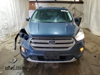 2018 Ford Escape SE z VIN 1FMCU9GD6JUC30324, wystawiony jako Copart lot #55833765 z przebiegiem 48 016 mil mil oraz Szkoda całkowita • Salvage title. Historia ofert i sprzedaży dostępna na DreamBid. Obrazek 5.