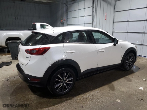 2018 Mazda CX-3 Touring with VIN JM1DKFC78J0308512, listed as a Copart auction lot 42397405 with 76,838 mi miles and Salvage Title. Bid and sale history available at carsss.com. Image 3.