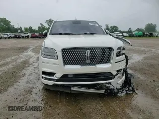 2019 Lincoln Navigator Black Label z VIN 5LMJJ2TT0KEL21795, wystawiony jako Copart lot #61016525 z przebiegiem 65 751 mil mil oraz Szkoda całkowita • Salvage title. Historia ofert i sprzedaży dostępna na DreamBid. Obrazek 15.
