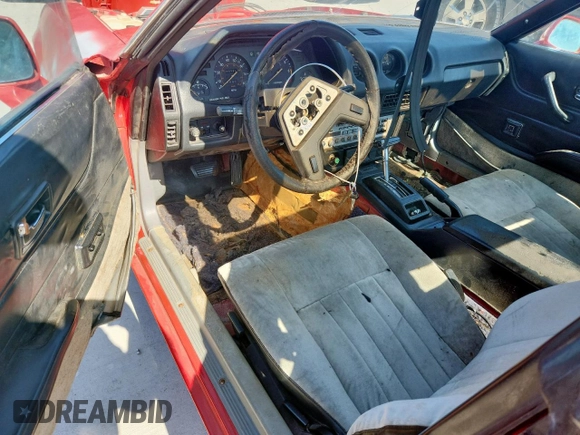 1983 Datsun 280ZX z VIN JN1HZ04S7DX575362, wystawiony jako Copart lot #57884445 z przebiegiem 216 083 mil mil oraz Czysty tytuł • Clean title. Historia ofert i sprzedaży dostępna na DreamBid. Obrazek 8.