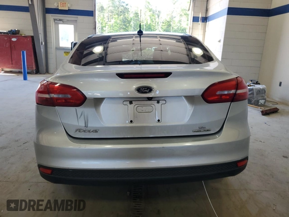 2016 Ford Focus SE с VIN 1FADP3F28GL280966, выставлен на аукционе Copart как лот 57911285 с пробегом Не указан миль и Списание • Salvage title. История ставок и продаж доступна на DreamBid. Изображение 6.