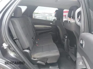 2014 Dodge Durango SXT with VIN 1C4RDJAG7EC307118, listed as a IAAI auction lot 42168781 with 92,977 mi miles and . Bid and sale history available at DreamBid. Image 8.
