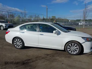 2014 Honda Accord EX-L with VIN 1HGCR2F82EA163330, listed as a IAAI auction lot 41920561 with 86,890 mi miles and . Bid and sale history available at carsss.com. Image 13.