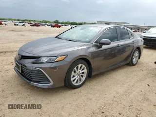 2023 Toyota Camry LE z VIN 4T1C11AKXPU134674, wystawiony jako Copart lot #54442665 z przebiegiem 40 352 mil mil oraz Czysty tytuł • Clean title. Historia ofert i sprzedaży dostępna na DreamBid. Obrazek 1.