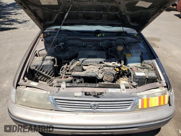 1993 Subaru Legacy L with VIN 4S3BJ6339P6948161, listed as a Copart auction lot 63123584 with 329,619 mi miles and Salvage Title. Bid and sale history available at DreamBid. Image 13.