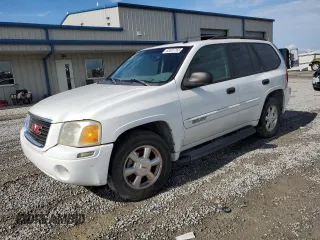 2004 GMC Envoy SLT with VIN 1GKDS13S242217806, listed as a Copart auction lot 63337765 with Not provided miles and Clean title. Bid and sale history available at DreamBid. Image 1.