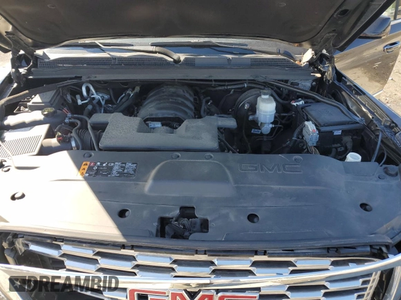 2019 GMC Yukon XL Denali with VIN 1GKS2HKJ9KR264134, listed as a Copart auction lot 43138545 with 105,690 mi miles and Salvage Title. Bid and sale history available at DreamBid. Image 12.