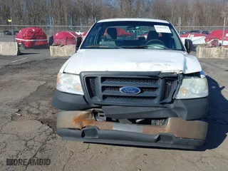 2005 Ford F-150 XL with VIN 1FTRF12285NB41452, listed as a IAAI auction lot 41903892 with 290,233 mi miles. Bid and sale history available at carsss.com. Image 6.