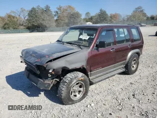 2000 Isuzu Trooper S with VIN JACDJ58X2Y7J11793, listed as a Copart auction lot 77431754 with 214,854 mi miles and Clean Title. Bid and sale history available at DreamBid. Image 1.