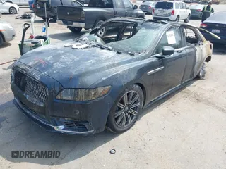 2017 Lincoln Continental Reserve with VIN 1LN6L9RPXH5618233, listed as a IAAI auction lot 42073706 with Not provided miles and . Bid and sale history available at DreamBid. Image 2.
