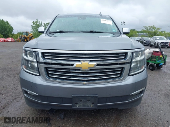 2019 Chevrolet Suburban Premier with VIN 1GNSKJKC9KR288722, listed as a IAAI auction lot 42282877 with 161,795 mi miles and . Bid and sale history available at DreamBid. Image 12.