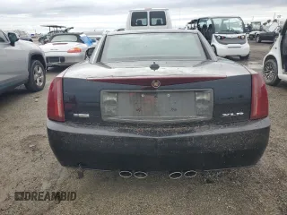 2004 Cadillac XLR z VIN 1G6YV34A445600668, wystawiony jako Copart lot #74595824 z przebiegiem Nie podano mil oraz Szkody całkowita. Historia ofert i sprzedaży dostępna na DreamBid. Obrazek 6.