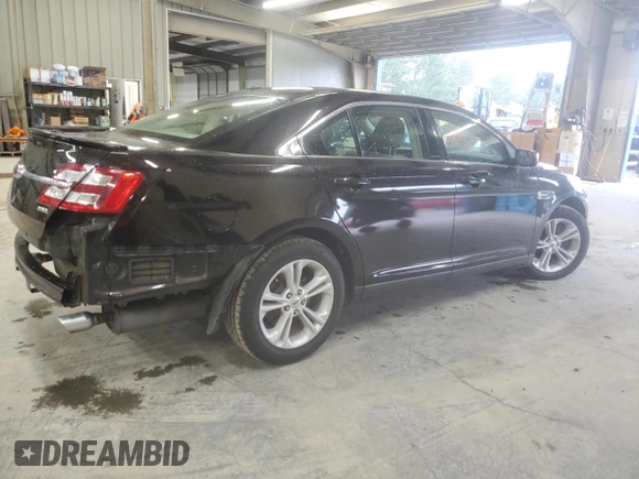2014 Ford Taurus SEL z VIN 1FAHP2E80EG128686, wystawiony jako Copart lot #57158255 z przebiegiem 69 529 mil mil oraz Szkoda całkowita • Salvage title. Historia ofert i sprzedaży dostępna na DreamBid. Obrazek 3.