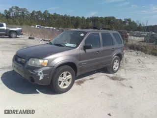 2006 Ford Escape Hybrid with VIN 1FMCU95H26KD48928, listed as a IAAI auction lot 41665769 with 173,313 mi miles. Bid and sale history available at carsss.com. Image 2.