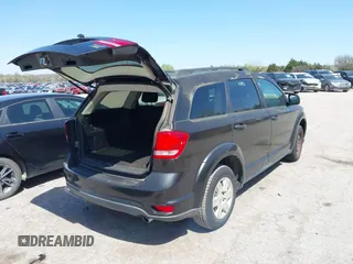 2011 Dodge Journey Mainstreet with VIN 3D4PG1FG0BT527937, listed as a IAAI auction lot 42003997 with 209,894 mi miles and . Bid and sale history available at carsss.com. Image 4.
