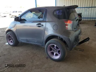 2012 Scion iQ z VIN JTNJJXB09CJ012794, wystawiony jako Copart lot #52983435 z przebiegiem 135 927 mil mil oraz Szkoda całkowita • Salvage title. Historia ofert i sprzedaży dostępna na DreamBid. Obrazek 2.
