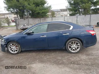2009 Nissan Maxima SV z VIN 1N4AA51E39C858279, wystawiony jako IAAI lot #41998838 z przebiegiem 185 315 mil mil oraz . Historia ofert i sprzedaży dostępna na DreamBid. Obrazek 14.