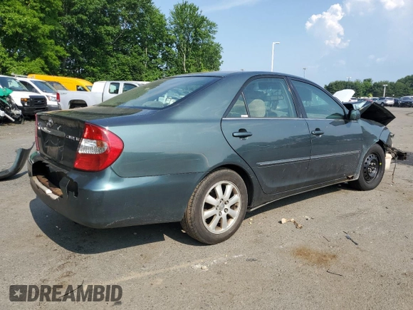2004 Toyota Camry LE with VIN 4T1BE30K04U290232, listed as a Copart auction lot 59788975 with Not provided miles and Salvage title. Bid and sale history available at DreamBid. Image 3.