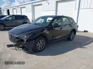 2023 Mazda CX-5 2.5 S with VIN JM3KFBAM3P0104813, listed as a IAAI auction lot 41540923 with 30,861 mi miles. Bid and sale history available at carsss.com. Image 18.