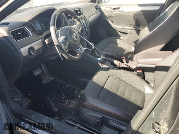 2014 Volkswagen Jetta GLI z VIN 3VW4T7AJ6EM398115, wystawiony jako Copart lot #89179925 z przebiegiem 81 264 mil mil oraz Szkoda całkowita • Salvage title. Historia ofert i sprzedaży dostępna na DreamBid. Obrazek 7.