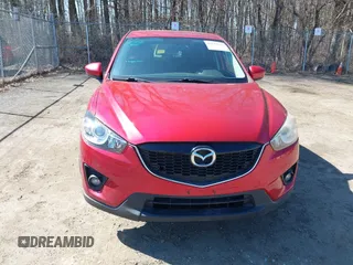 2014 Mazda CX-5 Touring with VIN JM3KE2CY2E0374440, listed as a IAAI auction lot 41634144 with 106,145 mi miles and . Bid and sale history available at DreamBid. Image 13.