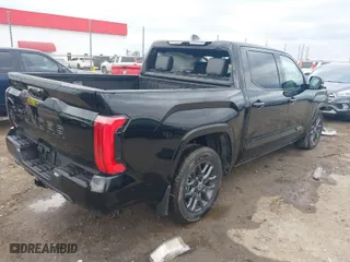 2024 Toyota Tundra 4WD Platinum with VIN 5TFNA5DB1RX222434, listed as a IAAI auction lot 40946913 with 2,594 mi miles. Bid and sale history available at carsss.com. Image 4.