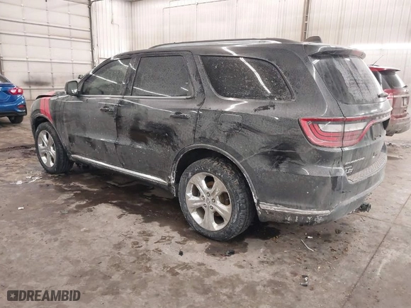 2014 Dodge Durango Limited with VIN 1C4RDJDG5EC977844, listed as a IAAI auction lot 41558932 with 133,703 mi miles. Bid and sale history available at carsss.com. Image 3.