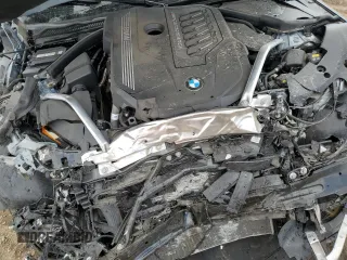 2022 BMW 4 Series M440i xDrive with VIN WBA13AW0XNFM27700, listed as a Copart auction lot 48406425 with Not provided miles and Salvage title. Bid and sale history available at DreamBid. Image 11.