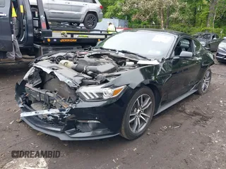 2016 Ford Mustang EcoBoost z VIN 1FA6P8TH8G5221774, wystawiony jako IAAI lot #42275505 z przebiegiem 111 115 mil mil oraz . Historia ofert i sprzedaży dostępna na DreamBid. Obrazek 2.