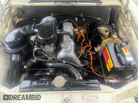 1967 Mercedes-Benz E with VIN 11001010184461, listed as a Copart auction lot 83359704 with 78,345 mi miles and Clean Title. Bid and sale history available at DreamBid. Image 7.
