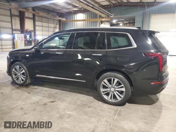 2020 Cadillac XT6 FWD Premium Luxury with VIN 1GYKPCRSXLZ154638, listed as a Copart auction lot 57439835 with 142,435 mi miles and Salvage title. Bid and sale history available at DreamBid. Image 2.