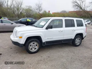 2014 Jeep Patriot Sport with VIN 1C4NJRBB1ED744101, listed as a IAAI auction lot 42009390 with 180,214 mi miles. Bid and sale history available at carsss.com. Image 15.