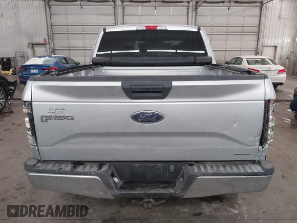 2015 Ford F-150 XLT with VIN 1FTEW1E89FFA44710, listed as a IAAI auction lot 41521584 with 158,297 mi miles. Bid and sale history available at carsss.com. Image 17.