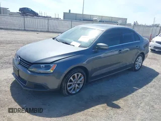 2013 Volkswagen Jetta Sedan SE w/Convenience/Sunroof with VIN 3VWBP7AJ3DM258887, listed as a IAAI auction lot 41611167 with 134,406 mi miles. Bid and sale history available at carsss.com. Image 2.