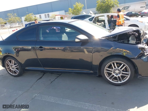 2008 Scion tC Spec with VIN JTKDE167580234717, listed as a IAAI auction lot 41980475 with 164,163 mi miles. Bid and sale history available at carsss.com. Image 13.