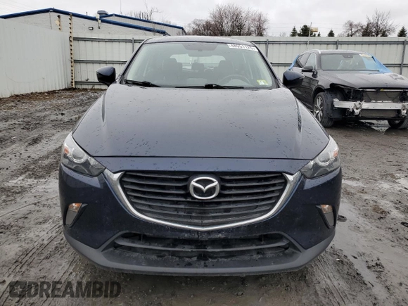 2017 Mazda CX-3 Touring with VIN JM1DKFC71H0164263, listed as a Copart auction lot 48951125 with 96,989 mi miles and Clean Title. Bid and sale history available at DreamBid. Image 5.