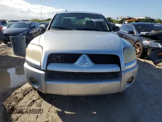 2007 Mitsubishi Raider LS z VIN 1Z7HC22K67S184917, wystawiony jako Copart lot #77839434 z przebiegiem 189 072 mil mil oraz Czysty tytuł • Clean title. Historia ofert i sprzedaży dostępna na DreamBid. Obrazek 5.
