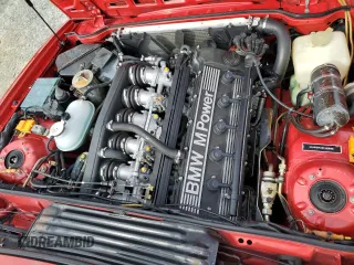 1988 BMW M6 z VIN WBAEE1416J2561063, wystawiony jako Copart lot #46515285 z przebiegiem 142 740 mil mil oraz Czysty tytuł • Clean title. Historia ofert i sprzedaży dostępna na DreamBid. Obrazek 11.
