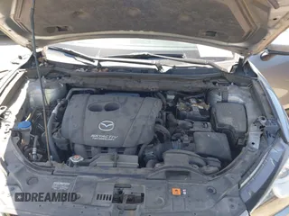2014 Mazda CX-5 Sport with VIN JM3KE2BE7E0371203, listed as a IAAI auction lot 42243756 with 121,534 mi miles and . Bid and sale history available at DreamBid. Image 10.
