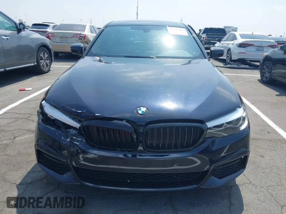 2018 BMW 5 Series 530i with VIN WBAJA5C51JG898278, listed as a IAAI auction lot 42595701 with 96,777 mi miles and . Bid and sale history available at DreamBid. Image 12.