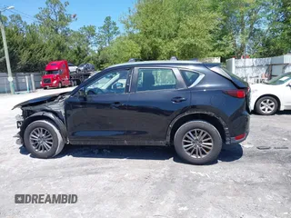 2018 Mazda CX-5 Sport with VIN JM3KFBBM4J0417018, listed as a IAAI auction lot 41984290 with 104,113 mi miles. Bid and sale history available at carsss.com. Image 15.