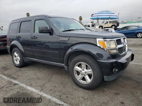 2008 Dodge Nitro SLT with VIN 1D8GT58K78W117240, listed as a Copart auction lot 82433244 with 245,392 mi miles and Salvage Title. Bid and sale history available at DreamBid. Image 4.