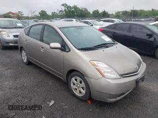 2006 Toyota Prius z VIN JTDKB20U067517414, wystawiony jako IAAI lot #42251158 z przebiegiem 233 266 mil mil oraz . Historia ofert i sprzedaży dostępna na DreamBid. Obrazek 1.