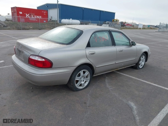 2002 Mazda 626 LX with VIN 1YVGF22DX25263864, listed as a IAAI auction lot 41846129 with 282,516 mi miles. Bid and sale history available at carsss.com. Image 4.